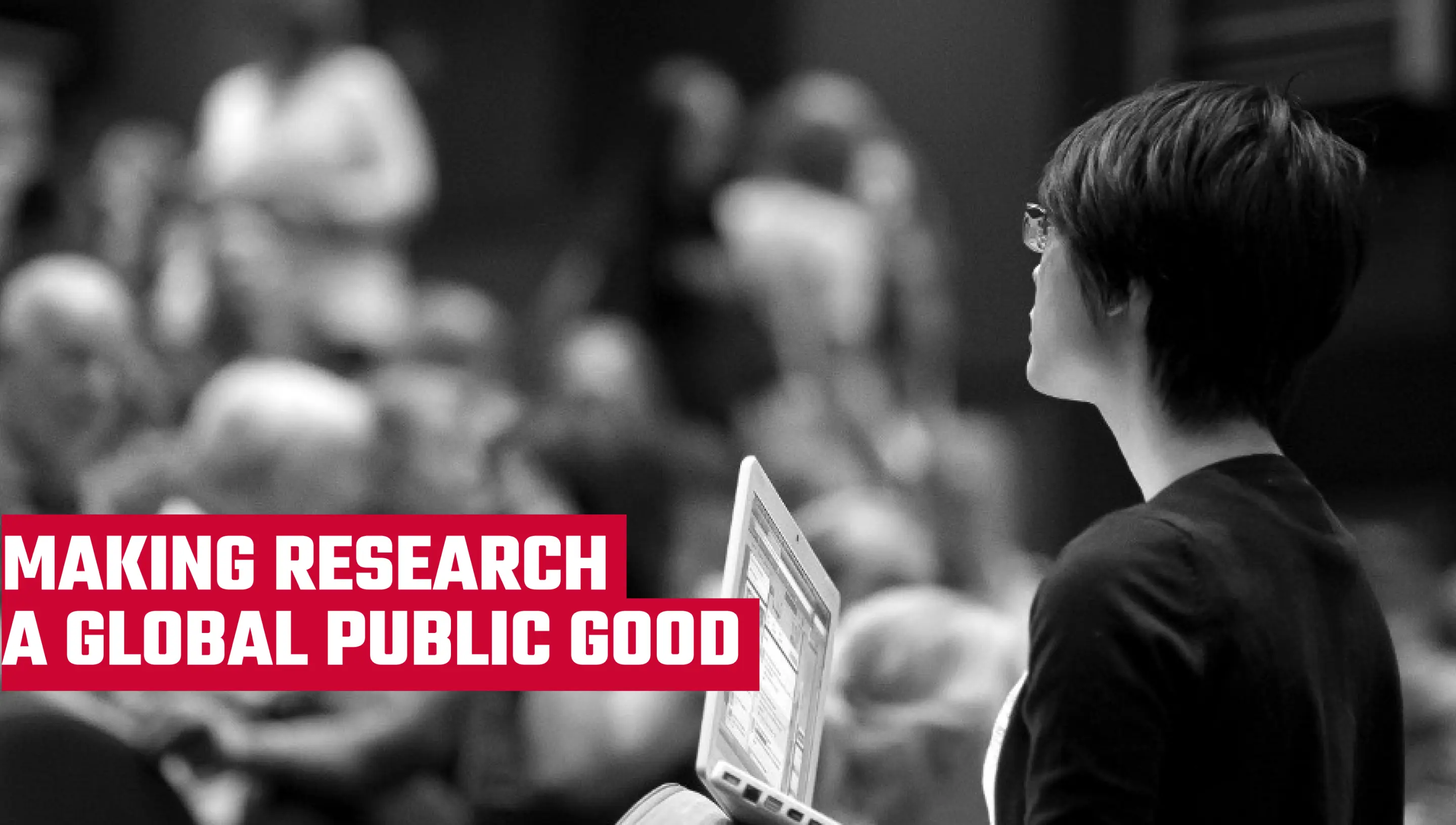 a woman is giving a lecture to a crowd, and there are words written on the picture that say "making research a global public good"