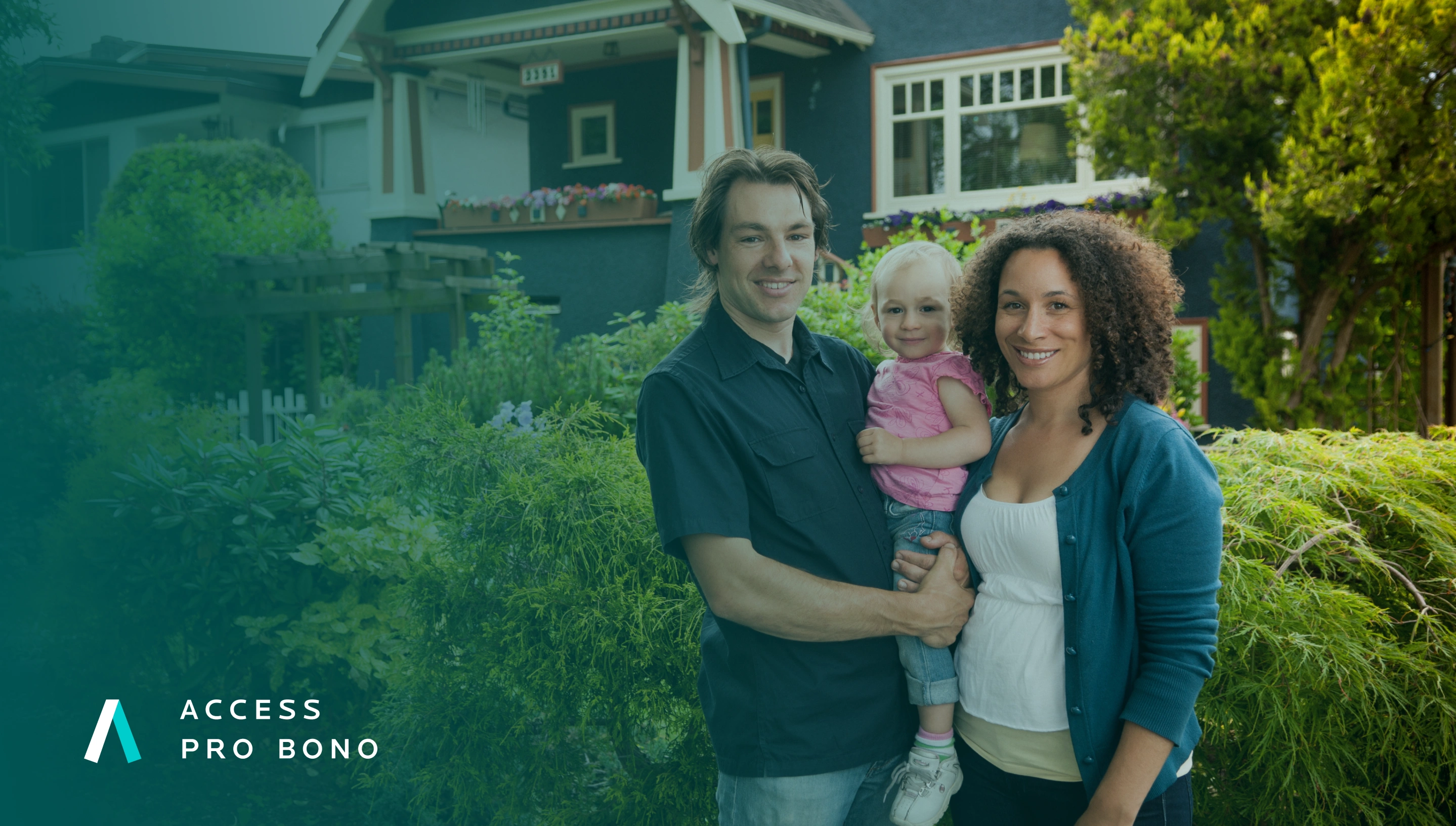 Man and woman holding a child in front of their home. Access Pro Bono logo is in the bottom left. 