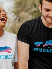 girl and guy wearing a t-shirt with the Great Climate change logo on it